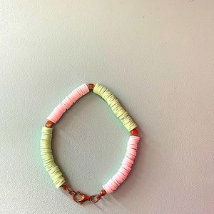 Here is this green and white bracelet!!!💚🤍 let me know if you would like it